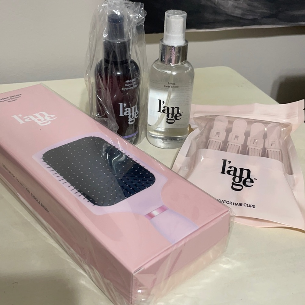 NIB L’ange hair bundle of 4 items. W/paddle brush